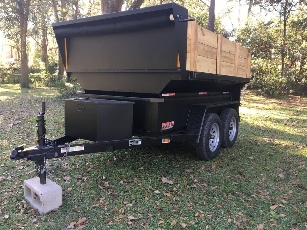 Tim's dumpster rental trailer available for drop-off in Mobile, Alabama and surrounding areas